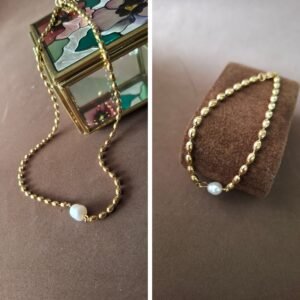 Conjunto Caviar de oro con perla